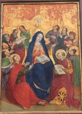 Ein Gemälde aus der Deutschordenskirche in Friesach. Es stellt Maria, die Jünger und die Apostel während ihres Gebets kurz vor dem Pfingstwunder dar.